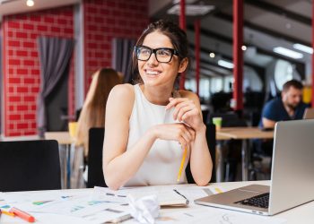 business-woman-working-at-office-desk business-woman-working-at-office-desk