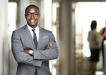 portrait-of-business-man-with-arms-crossed-in-office portrait-of-business-man-with-arms-crossed-in-office
